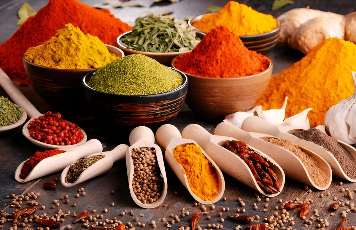 Indian seeds and spices exported by GTR International in wooden bowls and scoops